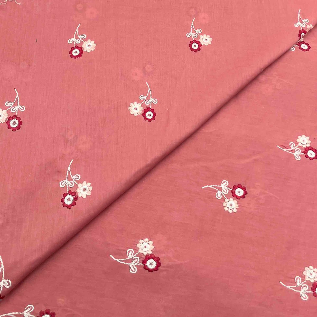 Lawn Emb D12128                            649/yard.  Required 2 yards for shirt